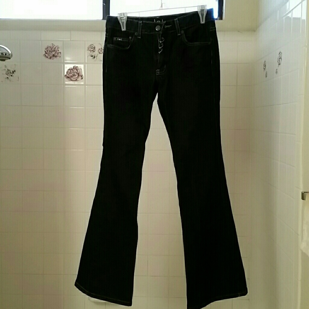 Jeans with rhinestone rings.